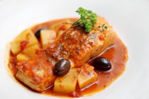 Roasted salmon with olive tapenade, ideal for the Mediterranean diet