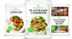 An open digital cookbook on a tablet showing colorful vegan recipes.
